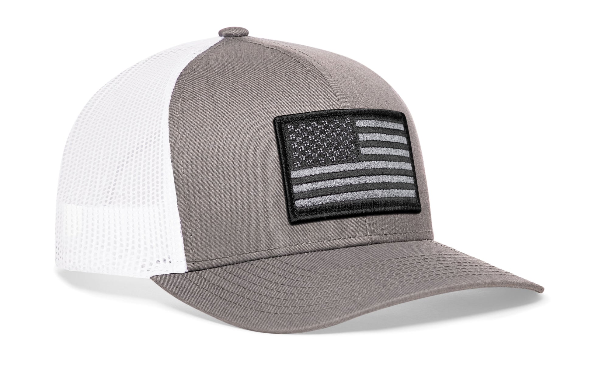 Gray/White trucker hat viewed from the right side, showcasing a American Flag Embroidered Rectangle Patch prominently displayed on the front