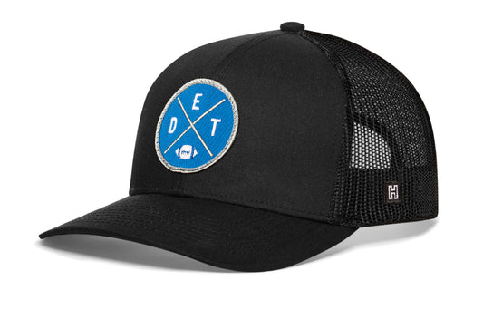 Haka Detroit trucker hat, black snapback, viewed from the left side. Represent Detroit football.