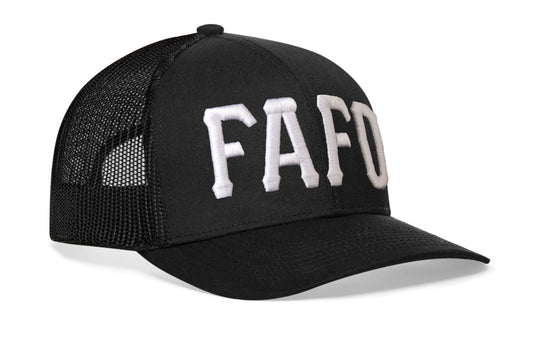 black trucker hat viewed from the right side, showcasing a White 'FAFO' Puff Embroidery 3D Embroidery prominently displayed on the front