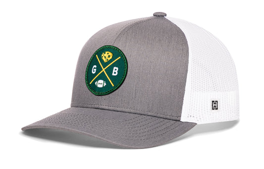 Haka Green Bay trucker hat, gray-white snapback, viewed from the left side. Represent Green Bay football.