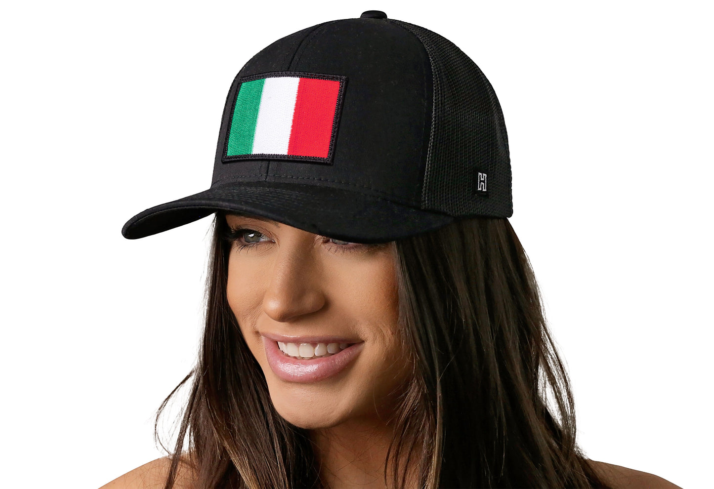 Black trucker hat worn by a female model viewed from the left side and features a Italian Flag Embroidered Rectangle Patch displayed on the front panel. The hat has a classic mesh back design and a curved structured bill
