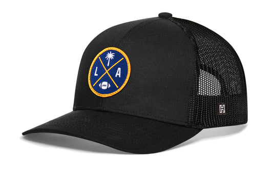 Haka Los Angeles trucker hat, black snapback, viewed from the left side. Represent LA football.