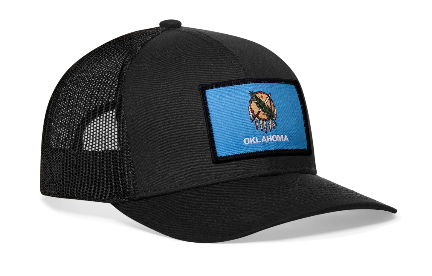 Black trucker hat viewed from the right side, showcasing a Oklahoma Flag Woven Rectangule Patch prominently displayed on the front