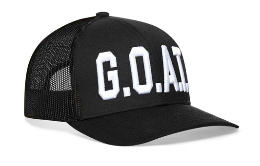 black trucker hat viewed from the right side, showcasing a GOAT bold white 3D embroidery prominently displayed on the front