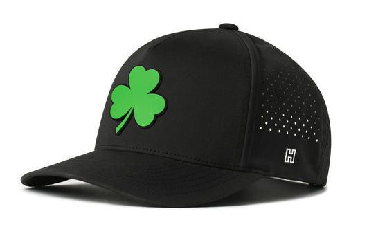 Shamrock Performance 5-Panel Hat, black snapback showing Haka brandmark on left side of cap.