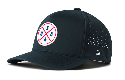 USA Performance 5-Panel Hat, navy snapback showing Haka brandmark on left side of cap.