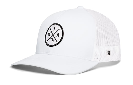 Miami Trucker Hat, white snapback showing Haka brandmark on left side of cap.
