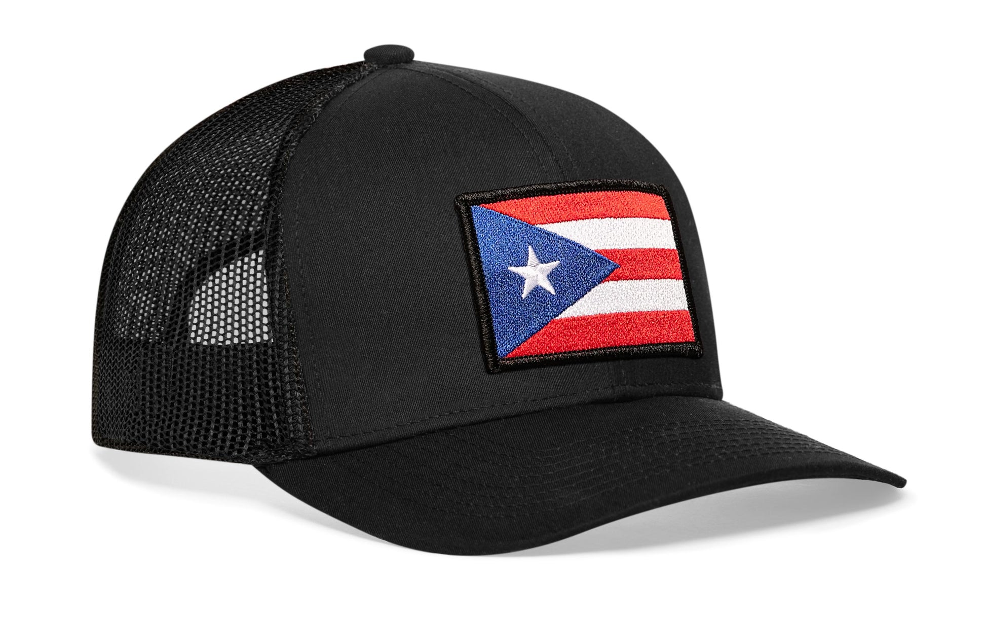 Black trucker hat viewed from the right side, showcasing a Puerto Rico Flag Embroidered Flag Patch prominently displayed on the front