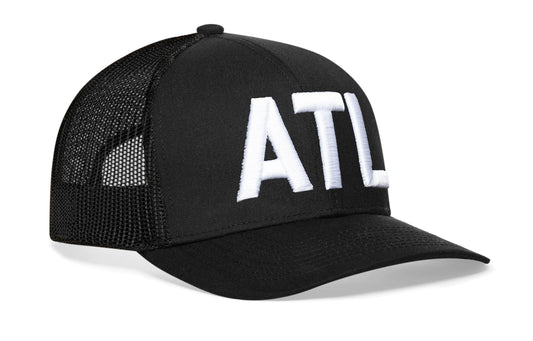 Black trucker hat viewed from the right side, showcasing a ATL 3-D Puff Direct Embroidery prominently displayed on the front