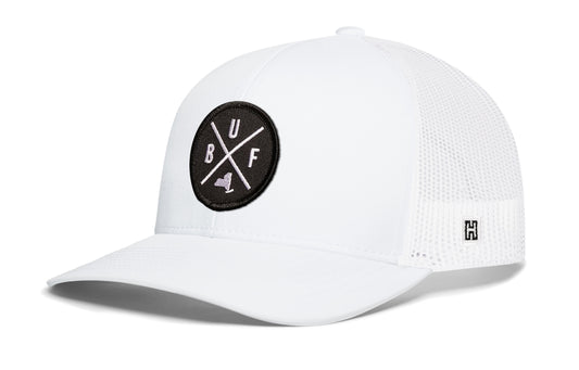 Buffalo Trucker Hat, white snapback showing Haka brandmark on left side of cap.