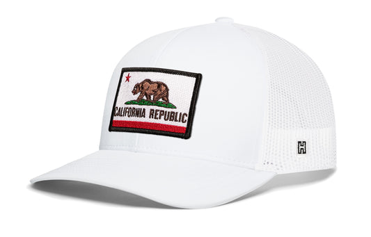 California Flag Trucker Hat, white snapback showing Haka brandmark on left side of cap.