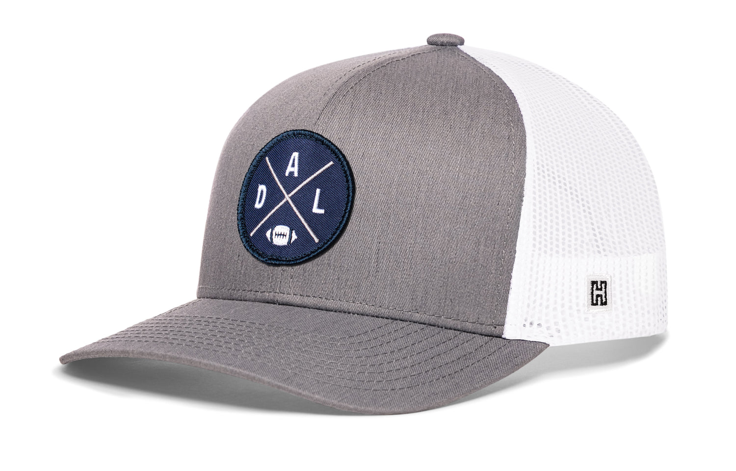 Dallas trucker hat, gray-white snapback showing Haka brandmark on left side mesh.
Rep Dallas, TX.