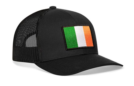 Black trucker hat viewed from the right side, showcasing a Ireland Flag Embroidered Rectangle Patch prominently displayed on the front