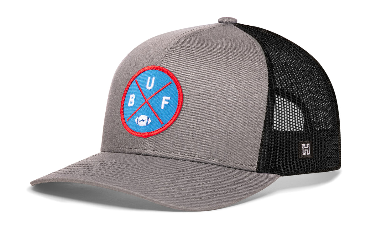 Buffalo Football Trucker Hat, gray-black snapback showing Haka brandmark on left side of cap.