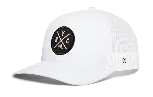 New York City Trucker Hat, white snapback showing Haka brandmark on left side of cap.