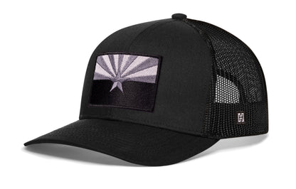 Arizona Flag Trucker Hat, black snapback showing Haka brandmark on left side of cap.