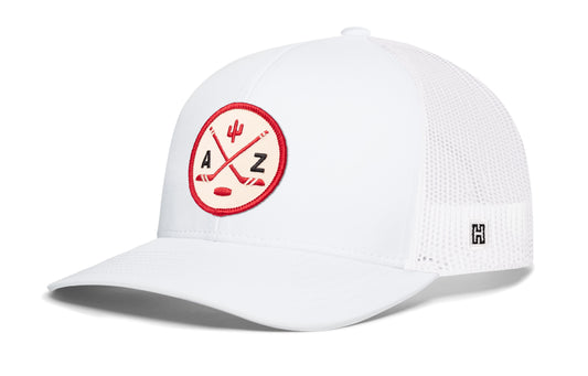 Arizona Hockey Trucker Hat, white snapback showing Haka brandmark on left side of cap.