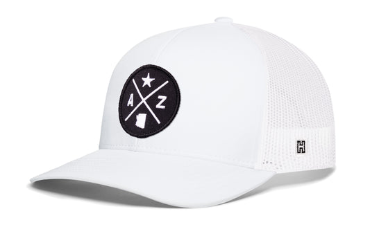 Arizona Trucker Hat, white snapback showing Haka brandmark on left side of cap.