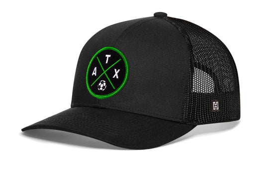 Austin Soccer Trucker Hat, black snapback showing Haka brandmark on left side of cap.