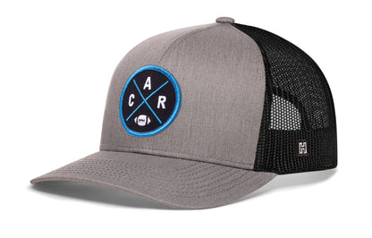 Carolina Football Trucker Hat, gray-black snapback showing Haka brandmark on left side of cap.