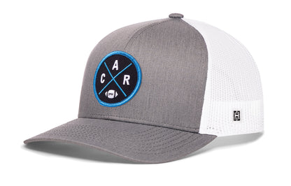Carolina Football Trucker Hat, gray-white snapback showing Haka brandmark on left side of cap.