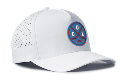 white performance 5-panel hat viewed from the right side, showcasing a bold columbia blue and maroon pvc patch prominently displayed on the front