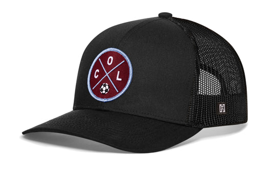 Colorado Soccer Trucker Hat, black snapback showing Haka brandmark on left side of cap.