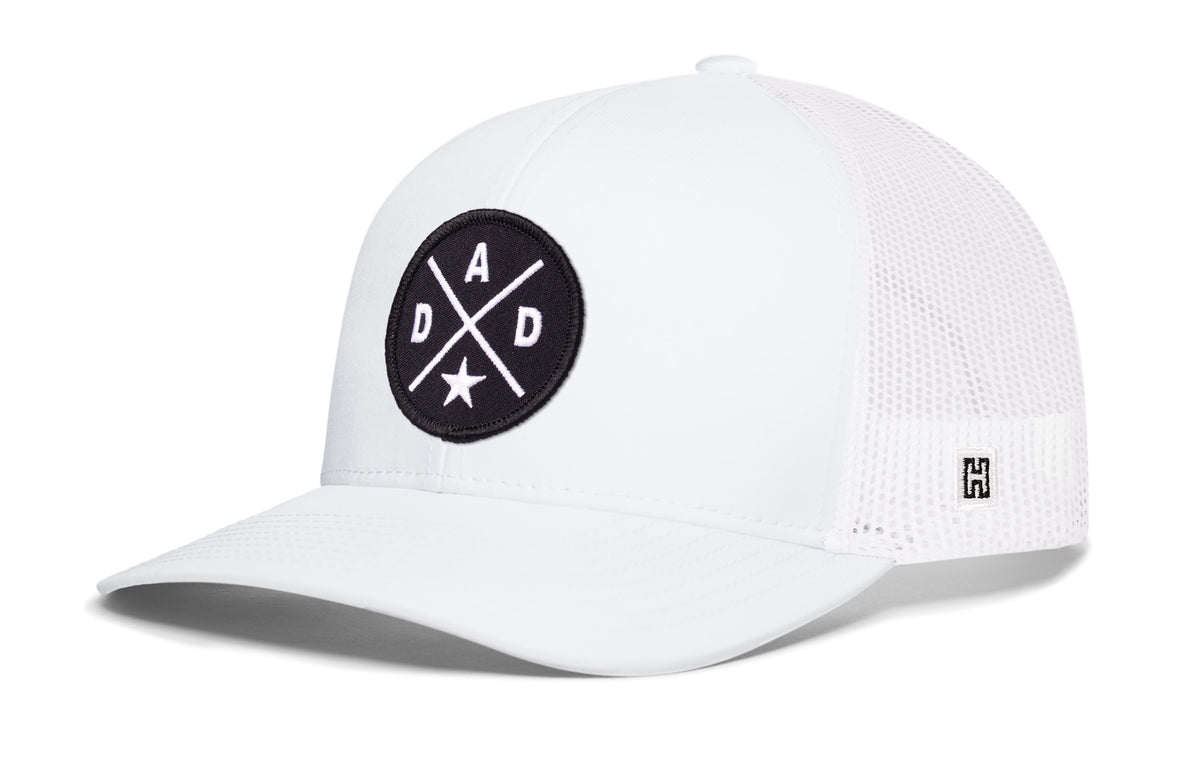 Dad X Trucker Hat, white snapback showing Haka brandmark on left side of cap.