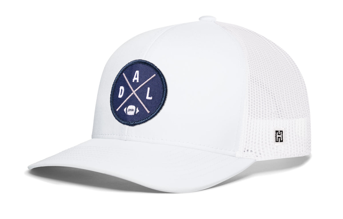 Dallas Football Trucker Hat, white snapback showing Haka brandmark on left side of cap.