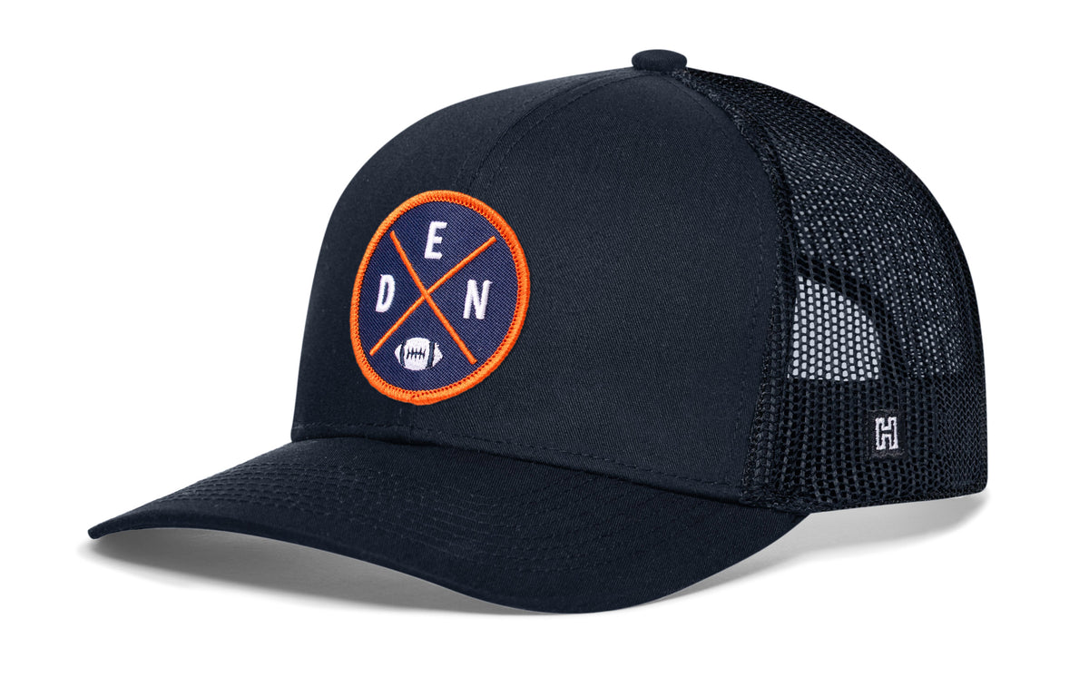 Denver Football Trucker Hat, navy snapback showing Haka brandmark on left side of cap.