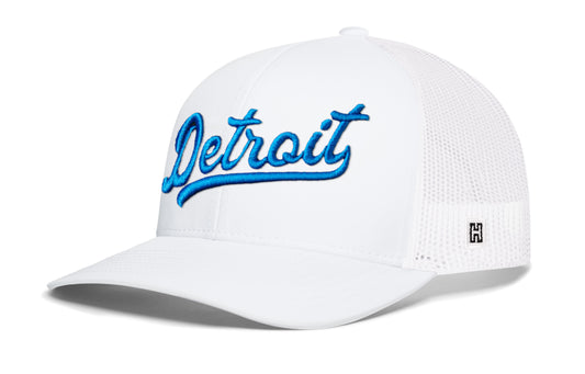 Detroit Trucker Hat, white snapback showing Haka brandmark on left side of cap.