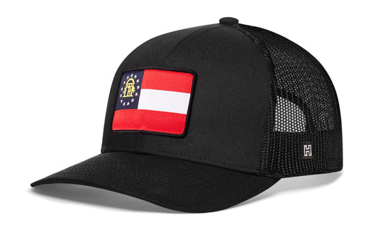 Georgia Flag Trucker Hat, black snapback showing Haka brandmark on left side of cap.