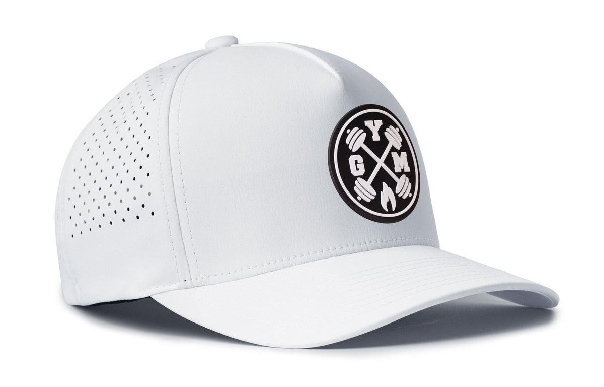 white performance 5-panel hat viewed from the right side, showcasing a bold black and white pvc patch prominently displayed on the front