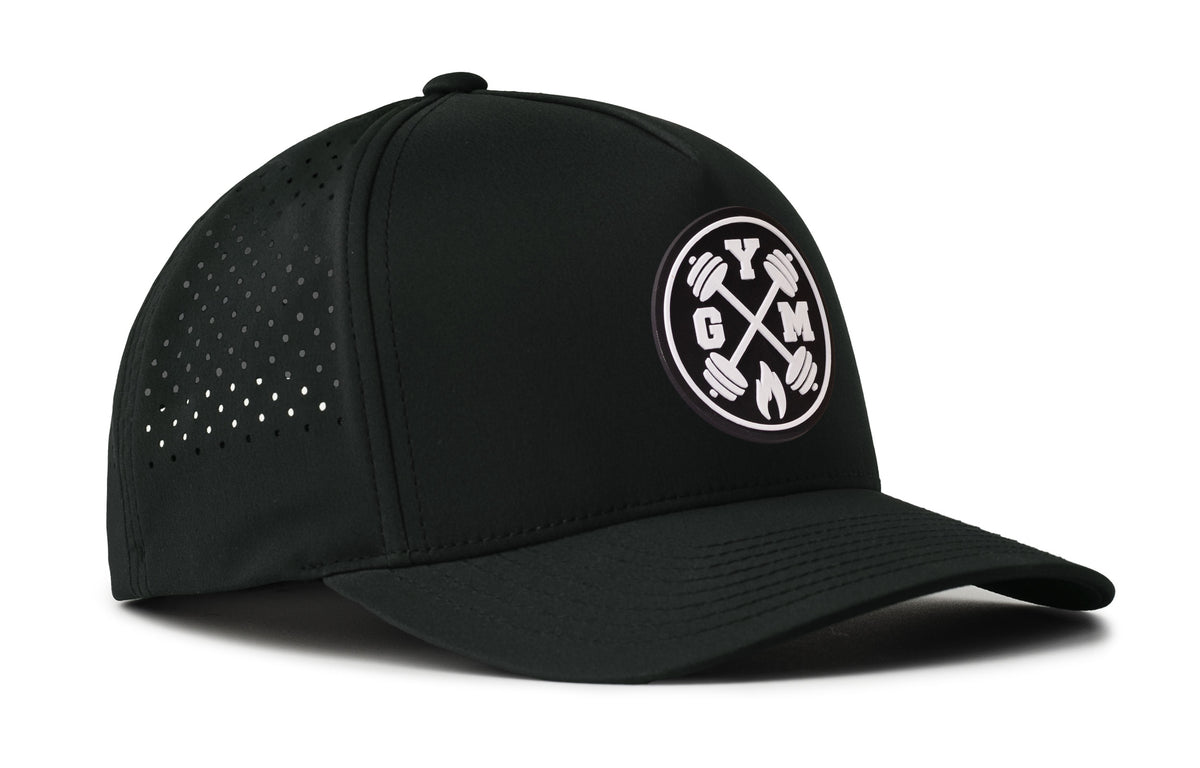 black performance 5-panel hat viewed from the right side, showcasing a bold black and white pvc patch prominently displayed on the front