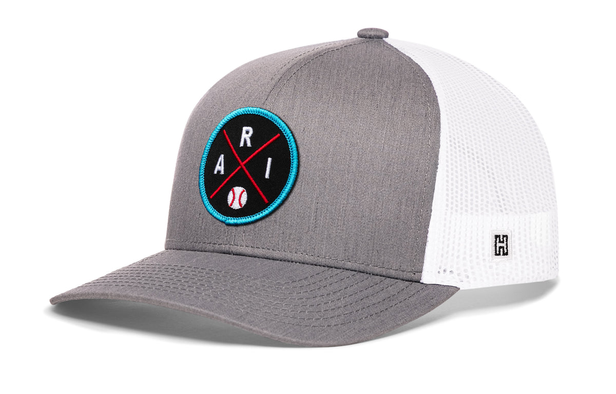 Arizona trucker hat, gray-white snapback showing Haka brandmark on left side mesh.
Rep Arizona.