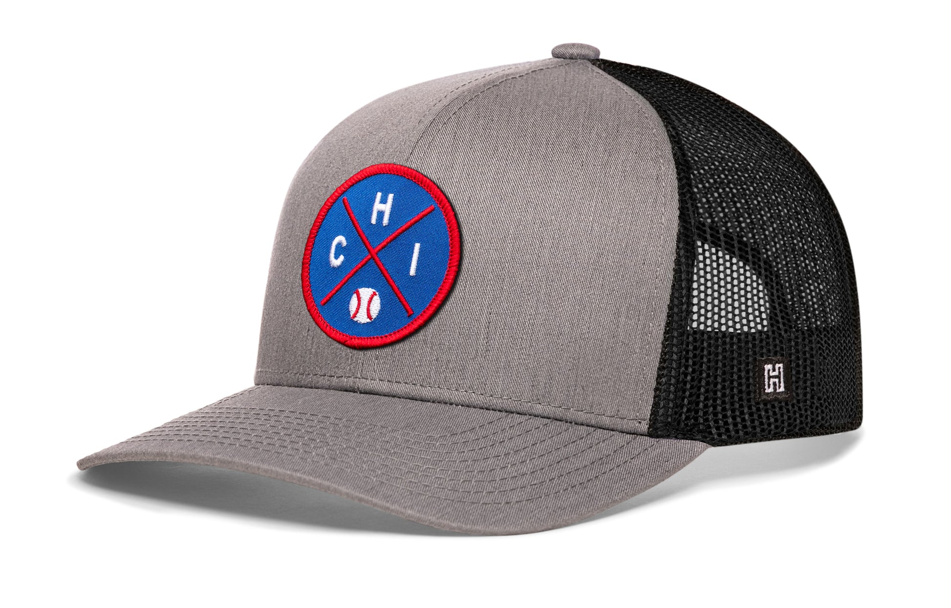 Chicago trucker hat, gray-black snapback showing Haka brandmark on left side mesh.
Rep Chicago, IL.