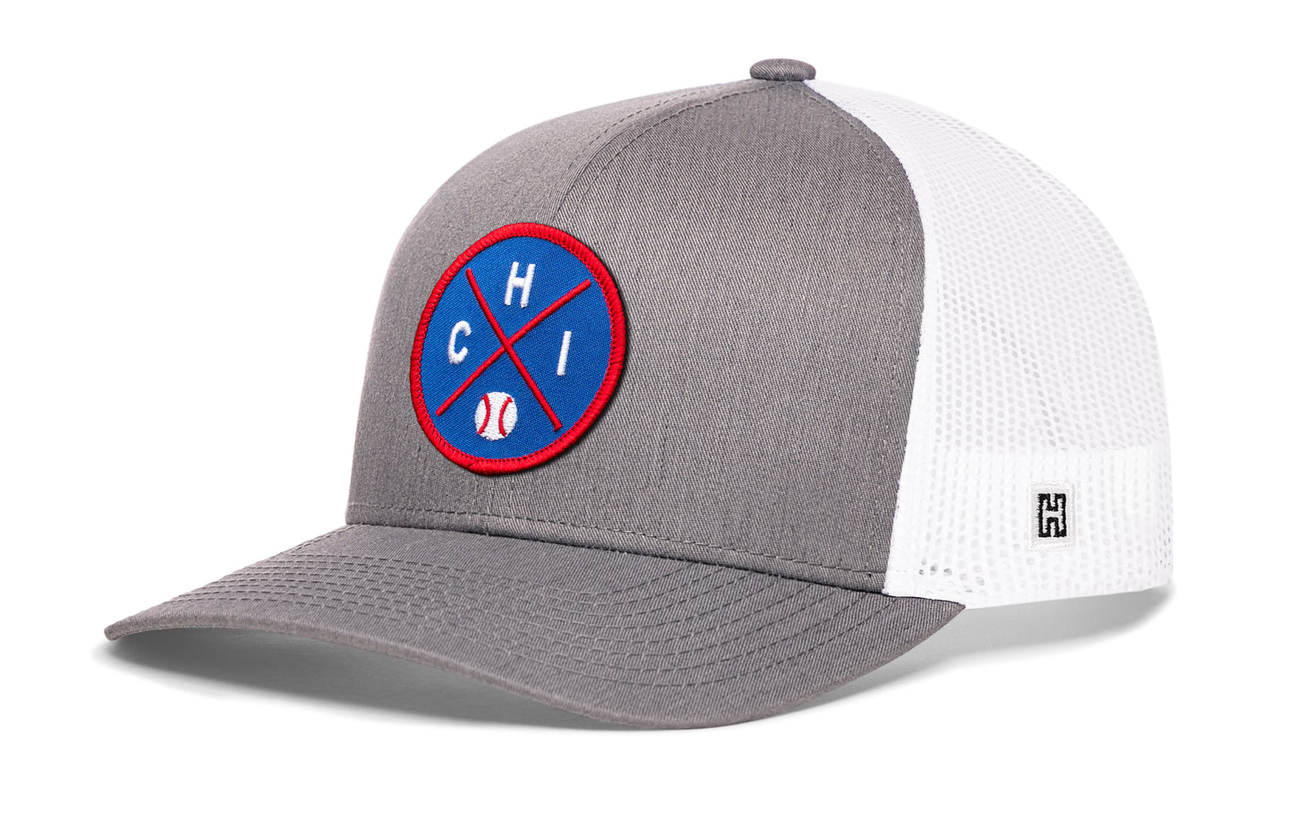 Chicago trucker hat, gray-white snapback showing Haka brandmark on left side mesh.
Rep Chicago, IL.