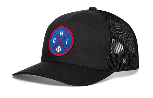 Chicago trucker hat, black snapback showing Haka brandmark on left side mesh of cap.
Rep Chicago, IL.