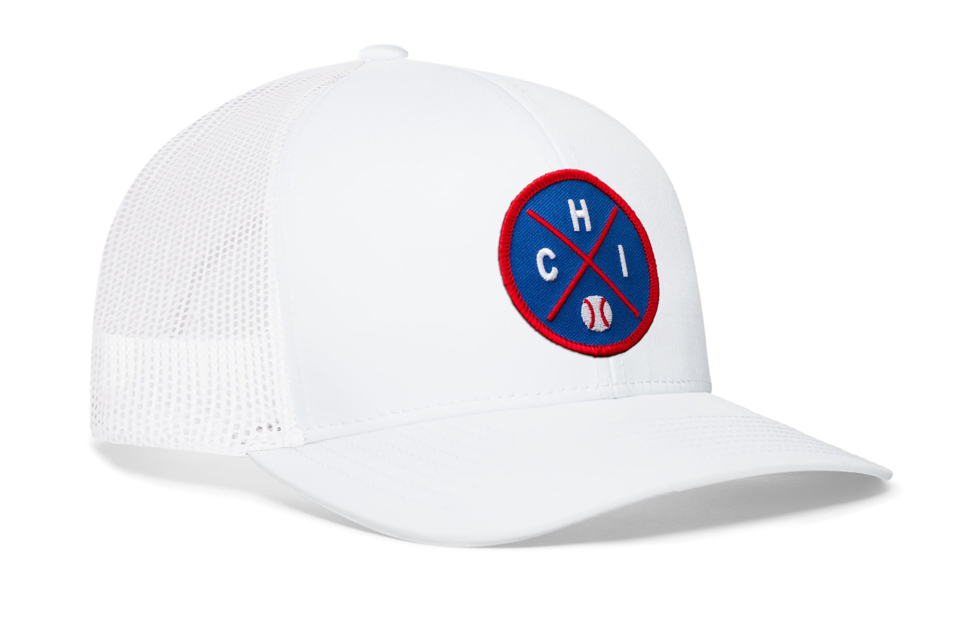 white trucker hat viewed from the right side, showcasing a royal and red baseball embroidered X patch prominently displayed on the front