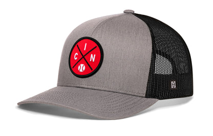 Cincinnati trucker hat, gray-black snapback showing Haka brandmark on left side mesh.
Rep Cincinnati, OH.