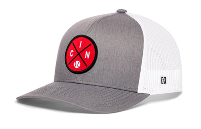 Cincinnati trucker hat, gray-white snapback showing Haka brandmark on left side mesh.
Rep Cincinnati, OH.