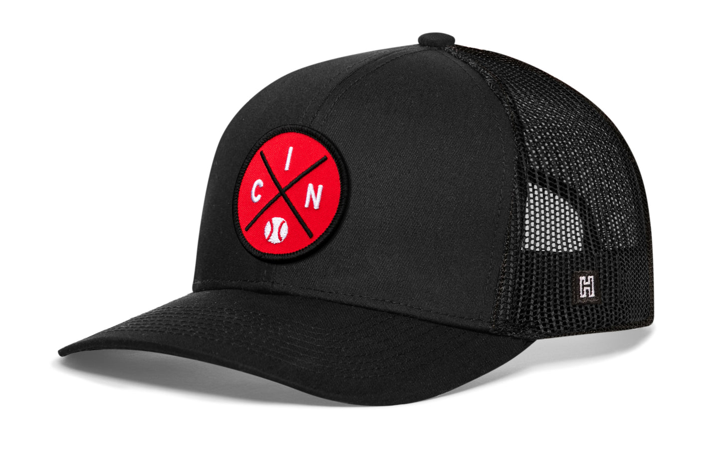Cincinnati trucker hat, black snapback showing Haka brandmark on left side mesh of cap.
Rep Cincinnati, OH.