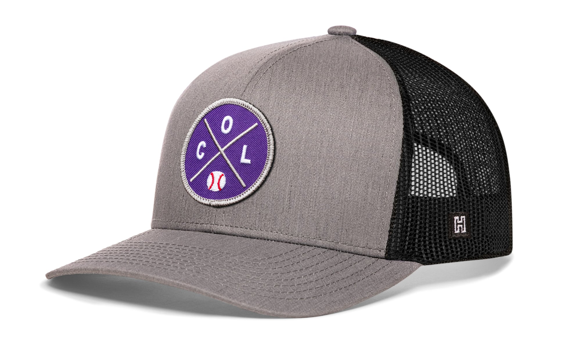 Colorado trucker hat, gray-black snapback showing Haka brandmark on left side mesh.
Rep Colorado.