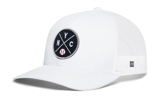 New York Baseball Trucker Hat, white snapback showing Haka brandmark on left side of cap.