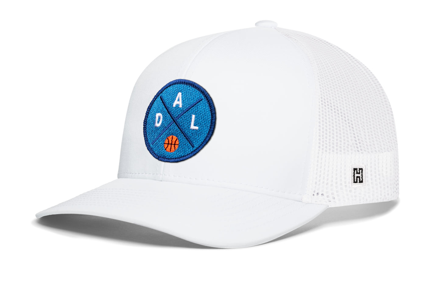 Dallas trucker hat, white snapback showing Haka brandmark on left side mesh of cap.
Rep Dallas, TX basketball.