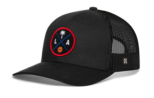 Los Angeles Basketball Trucker Hat, black snapback showing Haka brandmark on left side of cap.
