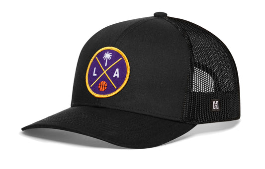 Los Angeles Basketball Trucker Hat, black snapback showing Haka brandmark on left side of cap.