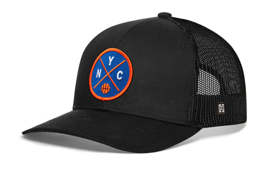New York Basketball Trucker Hat, black snapback showing Haka brandmark on left side of cap.