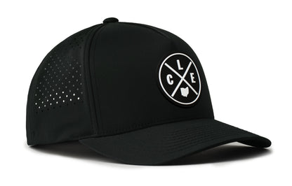 black trucker hat viewed from the right side, showcasing a bold black and white pvc patch prominently displayed on the front