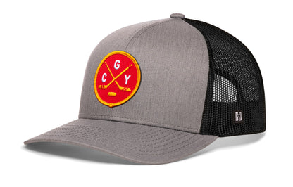 Calgary hockey trucker hat, gray-black snapback showing Haka brandmark on left side mesh.
Rep Calgary hockey.